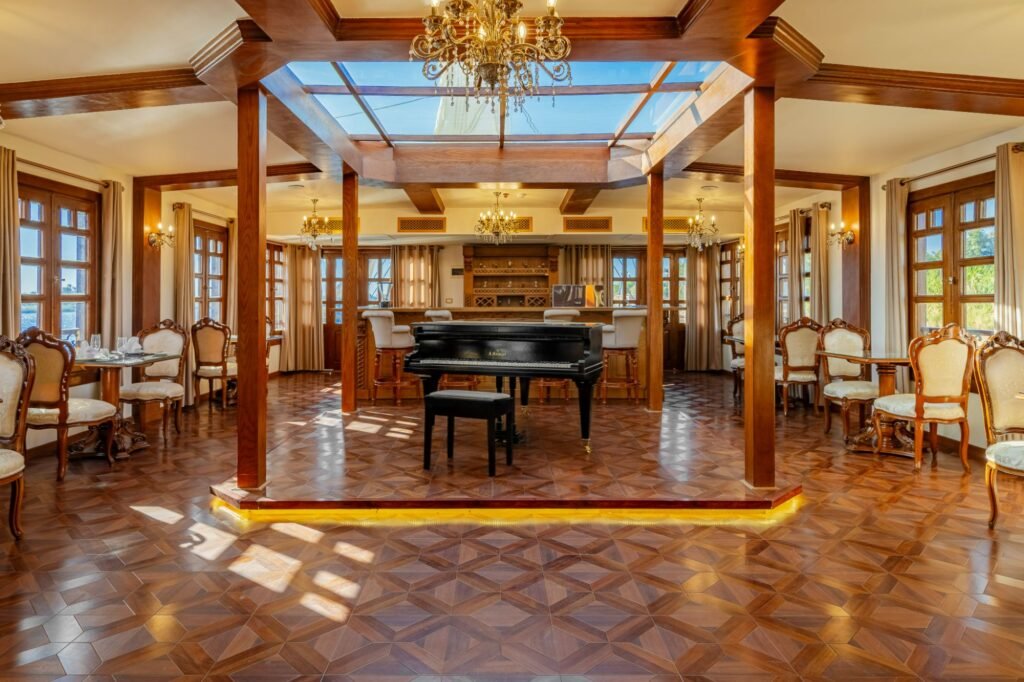 Lounge with a piano aboard a luxury Dahabiya